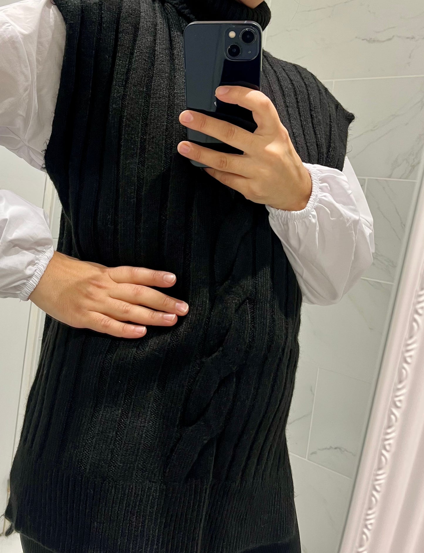Pull sans manche col montant