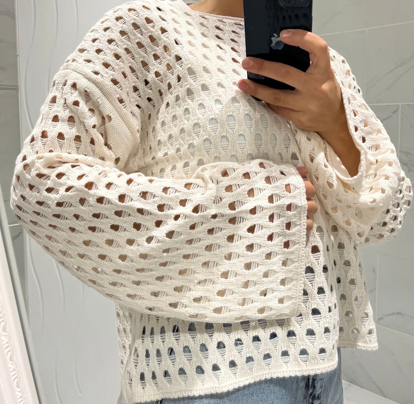 Pull écru en maille évidée